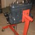 The engine just back from being overhauled by Model T expert Larry Hanson is shown mounted on a engine stand borrowed from Marshall Aune, a Model A friend.